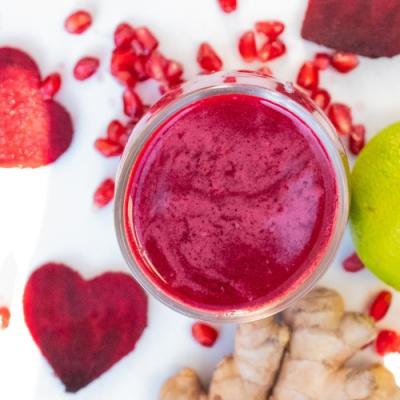 Beetroot juice with pomegranate, apple, lime, and ginger