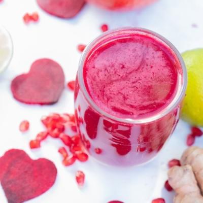Beetroot juice with pomegranate, apple, lime, and ginger