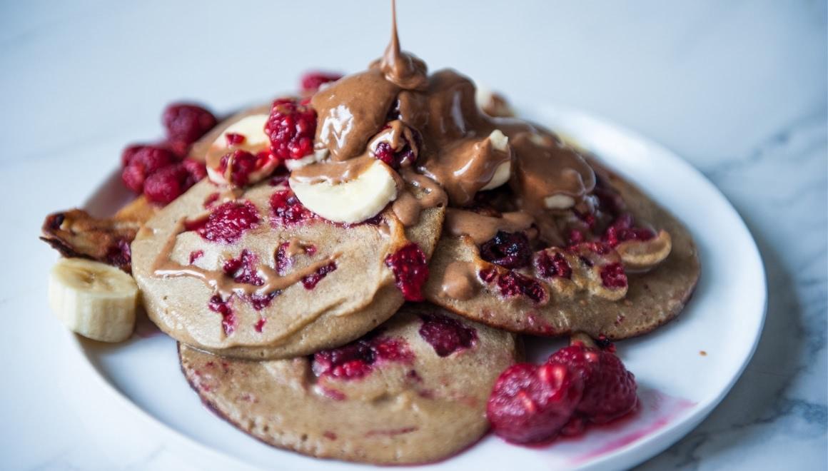 Prepare pancakes batter in blender and pour directly out of the blender container into the pan.